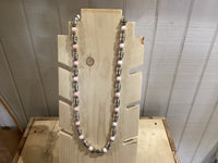 Pink Conch Shell and Stamped Sterling Drums