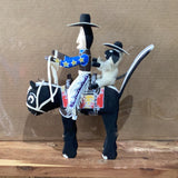 Delbert Buck Navajo Folk Art “Skunk Rider”.